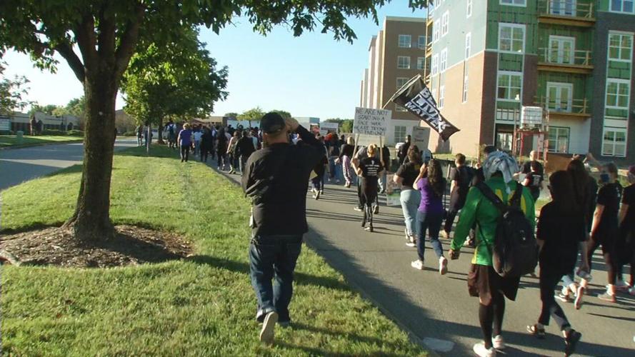 Crowd marches during rally outside AG Daniel Cameron's office in Louisville 9/18/20