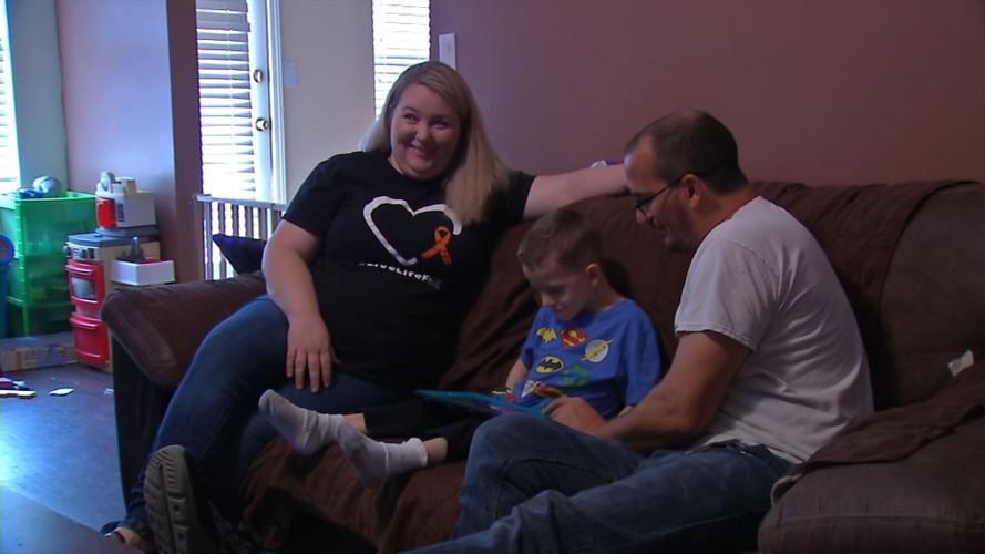 Arthur Brown, a 4-year-old boy with Prader-Willi syndrome, with his family