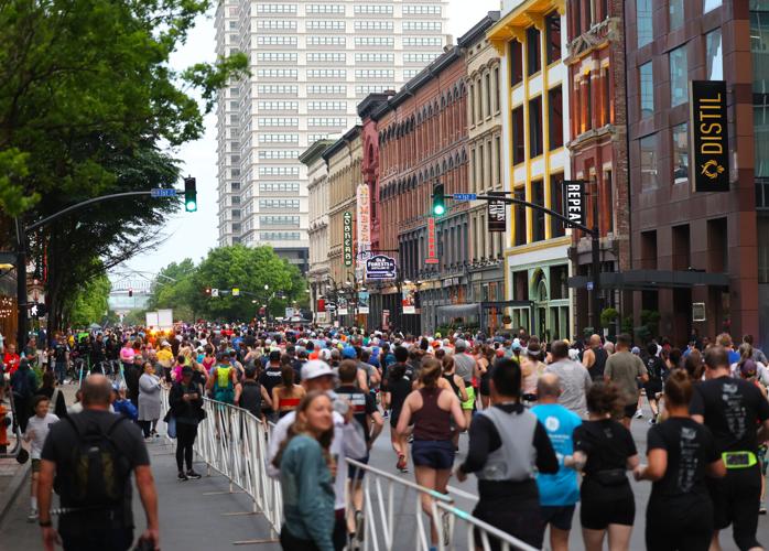 Runners go down Main Street Whiskey Row.JPG