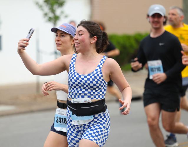 2 people take selfie while running.JPG
