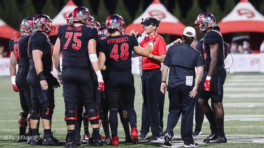 WKU Helton with team