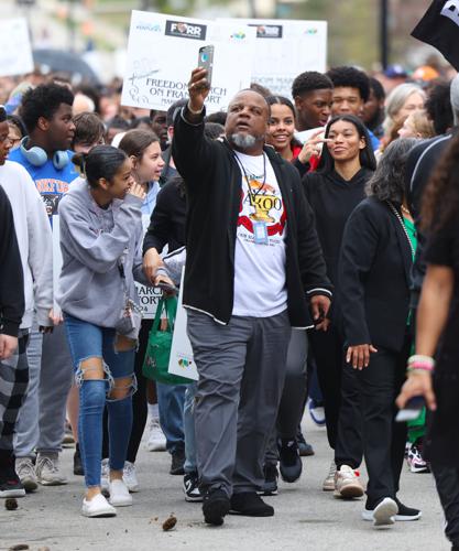 Man take selfie during March on Frankfort.JPG