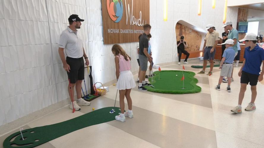 PGA GOLFERS WITH DIABETIC KIDS