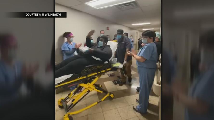 Recovered COVID-19 patient wheeled out.png