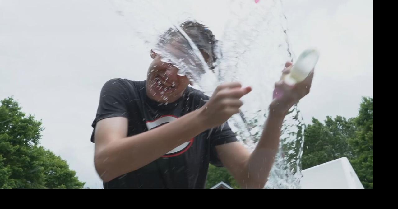 Student getting hit by water balloon on last day of school in