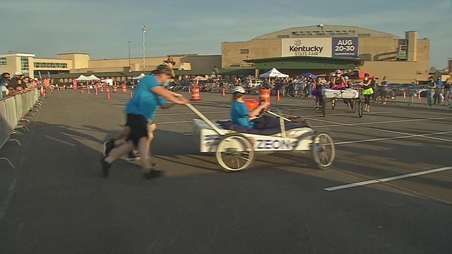 Teams participate in the Kentucky Derby Festival's Great Bed Races