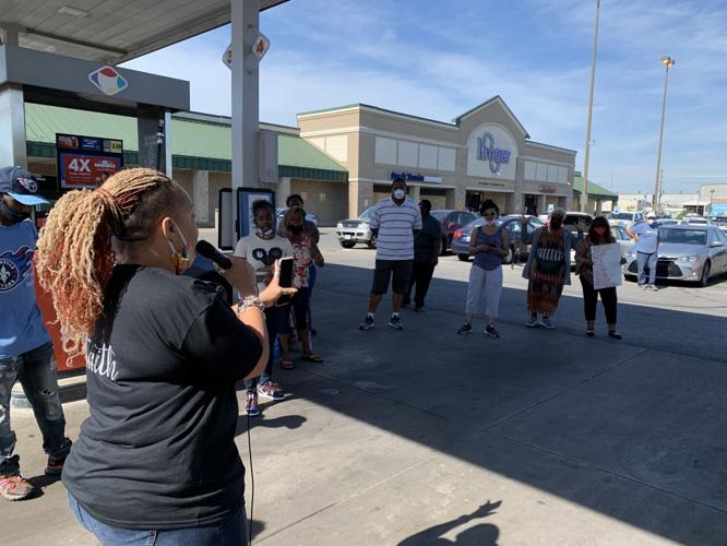 Faith leaders hold prayer service in the parking lot of looted Kroger