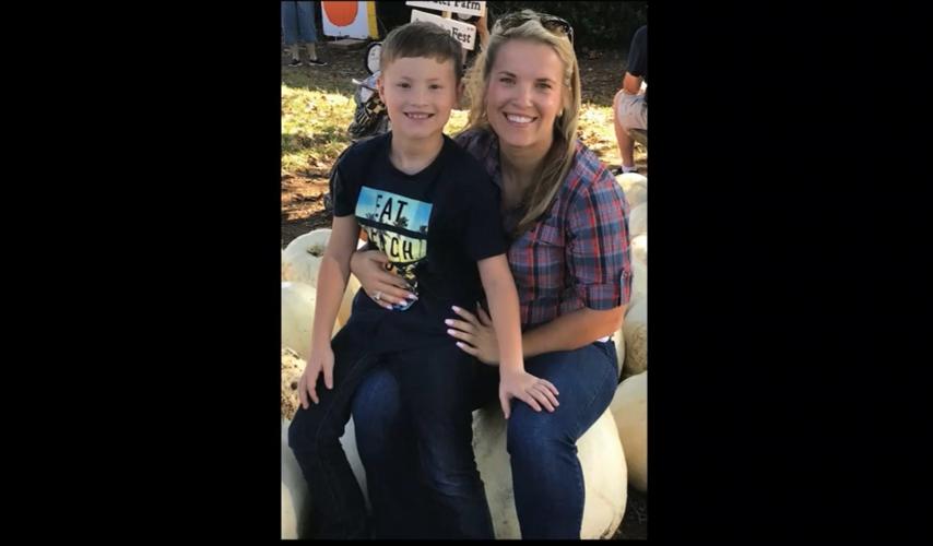 Det Deidre Mengedoht (pictured with a child).jpg