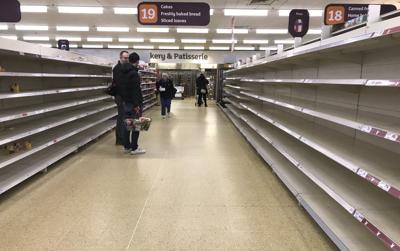 VIRUS - EMPTY GROCERIES - AP FILE 1.jpeg