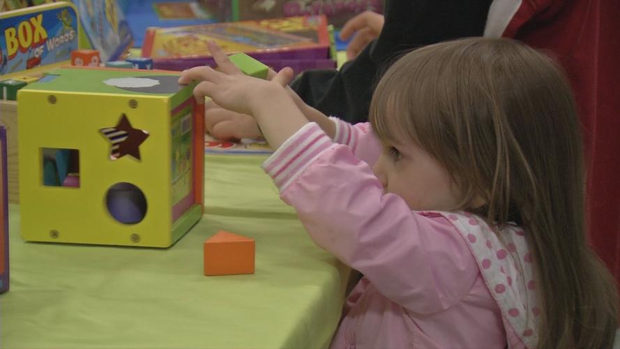 Child playing with toy