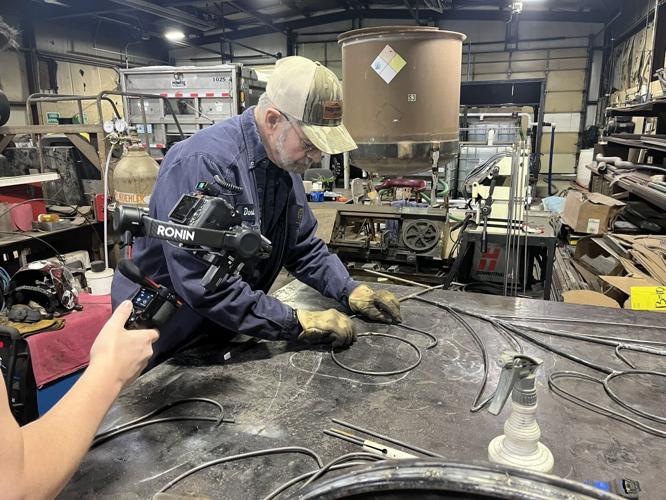 Madison, Ind. fabricator Dave Kidwell works on a holiday display