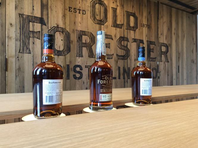 Old Forester distillery bottles on table