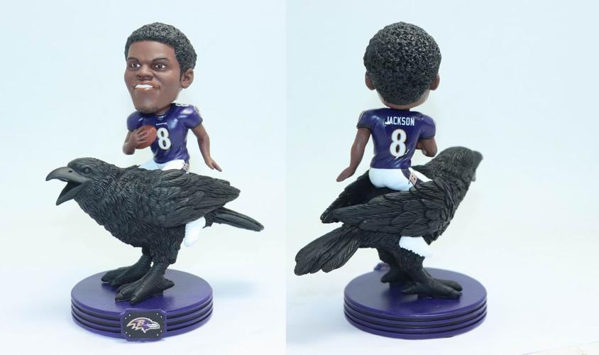 LAMAR JACKSON BOBBLEHEAD ON A RAVEN - 2-7-2020.png