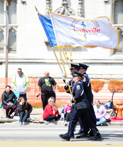 Flags move down Broadway.JPG