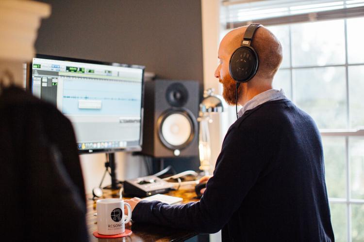 Resonate Recordings Lead Audio Engineer Adam Townsell Editing a Podcast.jpg