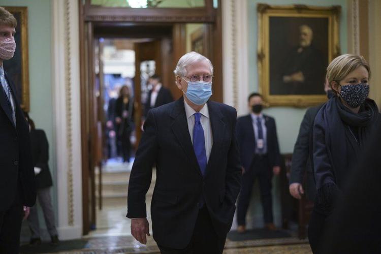 Mitchell McConnell leaves the chamber 2021 AP.jpeg