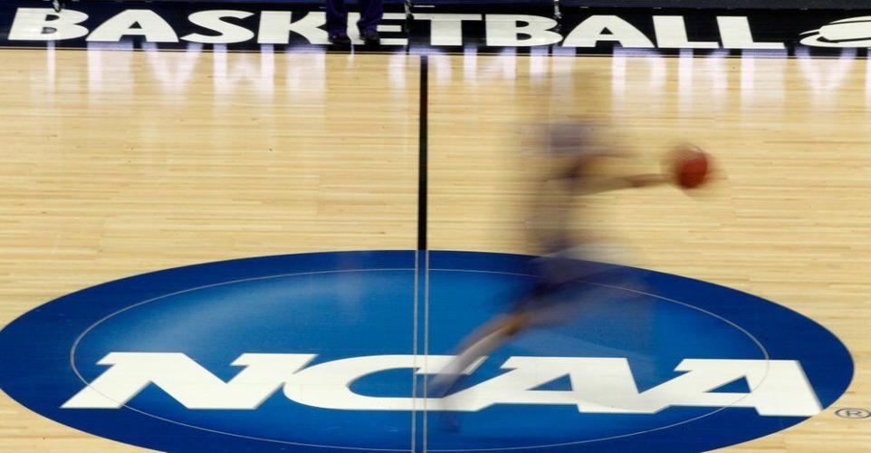 NCAA logo on gym floor