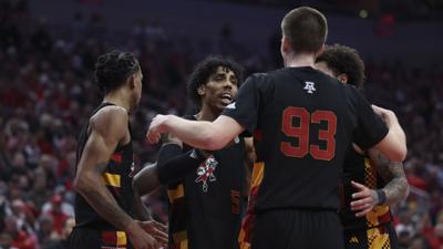 Louisville players huddle