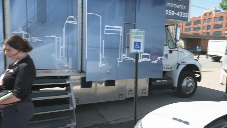 Norton Healthcare mobile unit outside Goodwill Opportunity Center on E. Broadway in Louisville