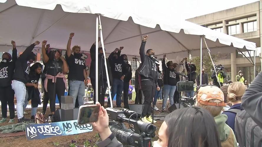 A choir performs at a rally marking one-year anniversary of Breonna Taylor's death