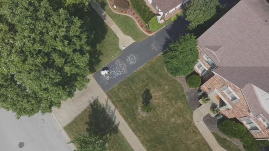 Louisville man transforms driveway into canvas for chalk work