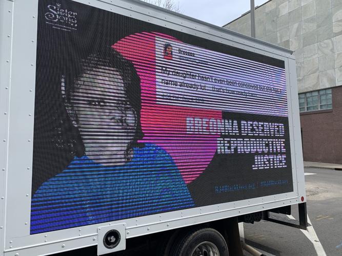 Breonna Taylor billboard parked outside LMPD HQ