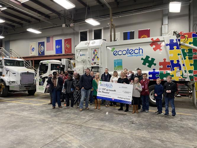 Ecotech presents $5,000 check to Families for Effective Autism Treatment