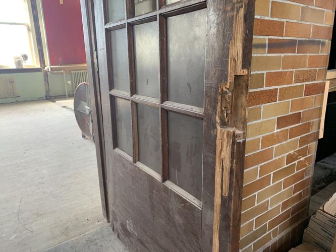 Architects work to preserve old doors from 1920s