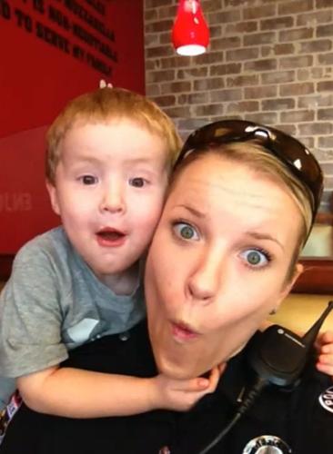 Det. Deidre Mengedoht (with a child).jpg