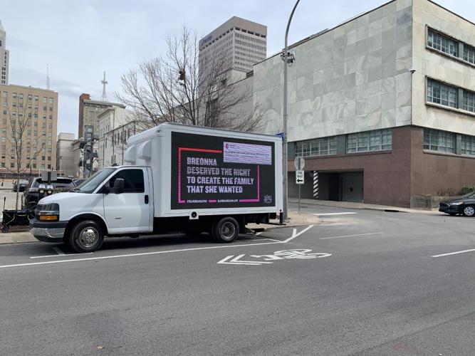 Breonna Taylor billboard parked outside LMPD HQ
