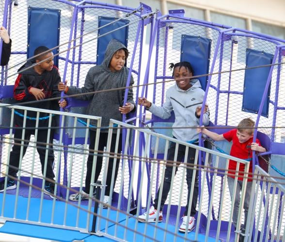 Boys ride roller coast at Chow Wagon.JPG
