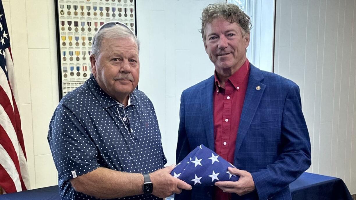Sen. Rand Paul presents an American flag to Vietnam Vet Steven Stoker