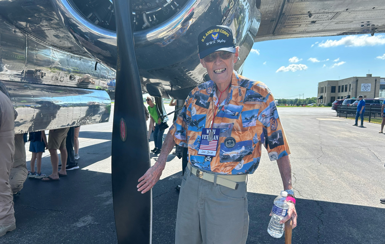 D-Day Anniversary: WWII veteran Lee Smith near B-25 Bomber at Bowman Field