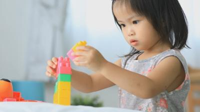child playing with blocks