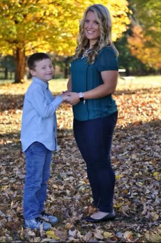 Det. Deidre Mengedoht (with a child).jpg