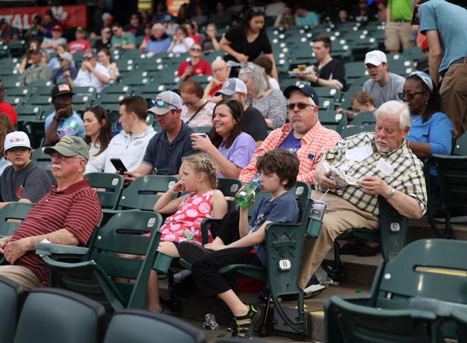 Bats fans watch from home plate.JPG