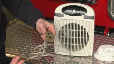 Space heater with burned cord