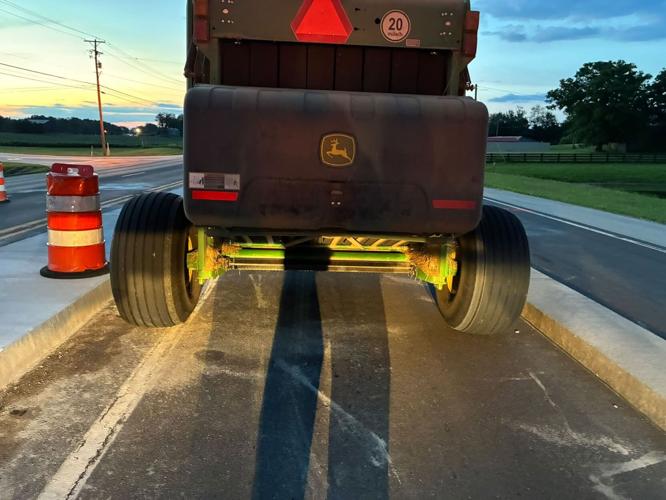 Round Baler passes through barriers