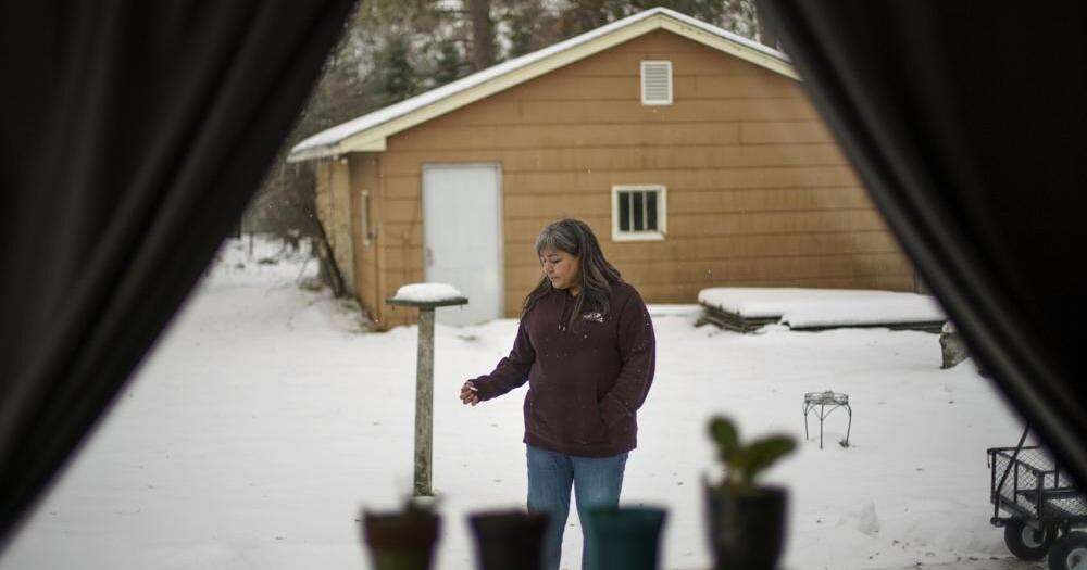 Rachel Taylor smokes a cigarette outside the home she shared with her son.jpeg |  | wdrb.com