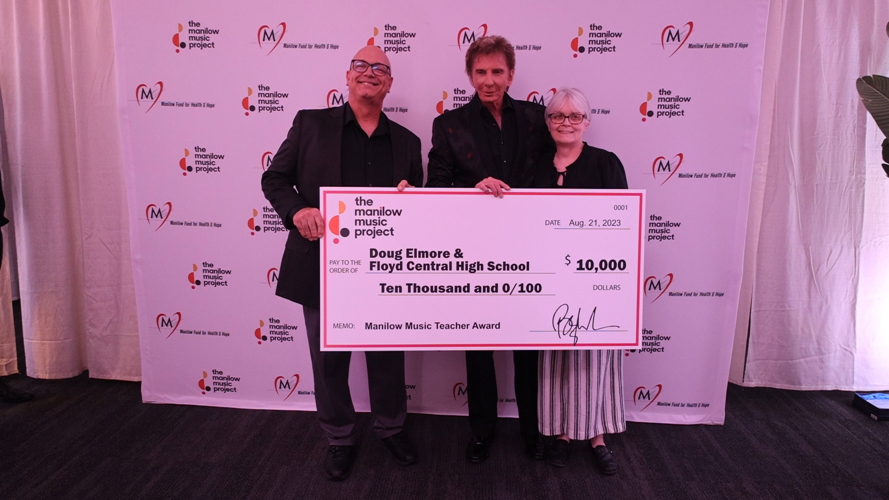 Barry Manilow and Doug Elmore and his wife