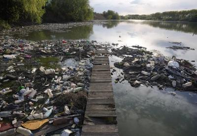 Waste and plastic bottles at the Danube River - FILE - AP - 5.31.23