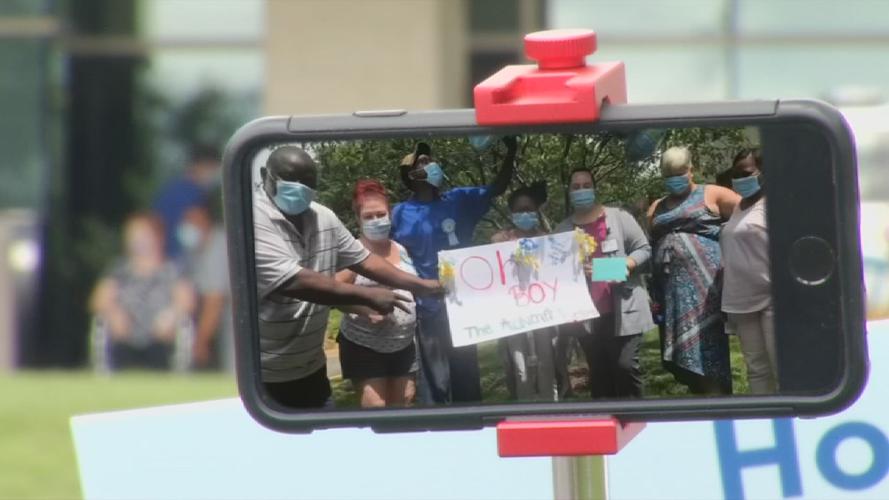 Family camps outside of Norton Hospital during pandemic to welcome baby