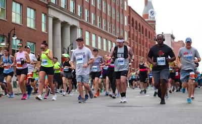 Marathon runners go down Main Street.JPG