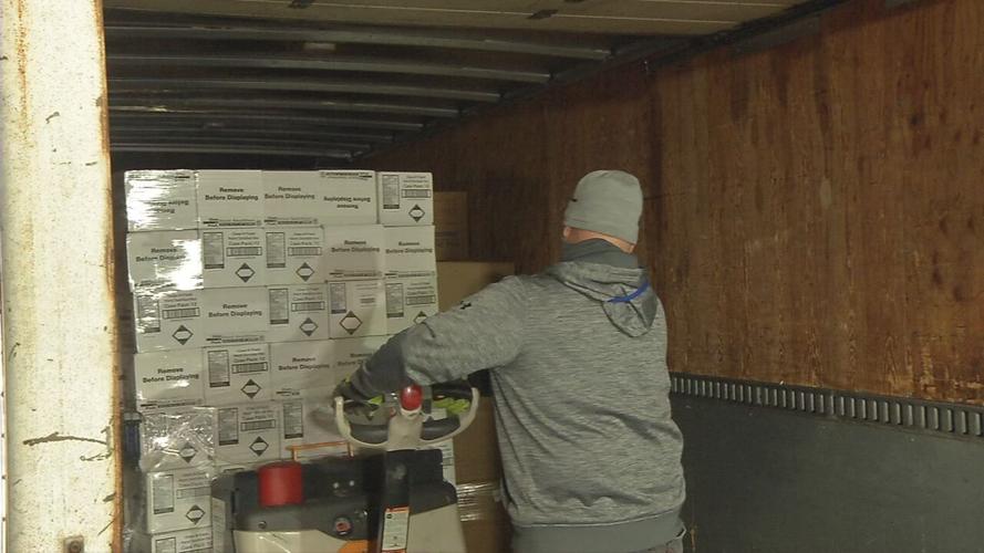 Boxes of face shields and PPE donated by SOS to JCPS on Feb. 26, 2021