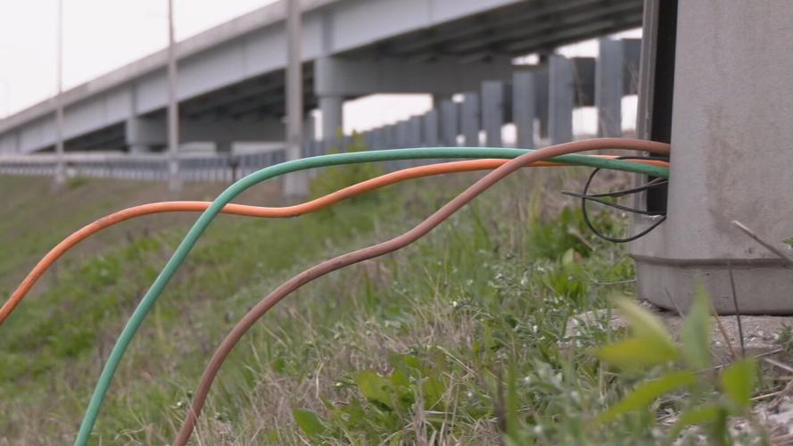 Exposed wires on an interstate light pole caused by copper thieves - 3.22.24