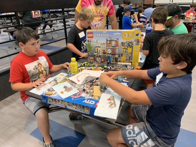 Children work on Lego sets in Charlestown.jpeg