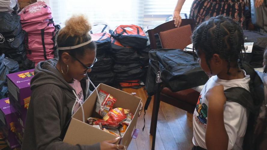 Winton and Hiestand law firm backpack giveaway 7-21-23