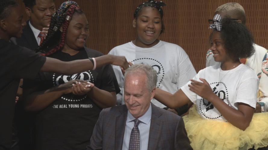 Fischer signs CROWN Act into law.jpeg