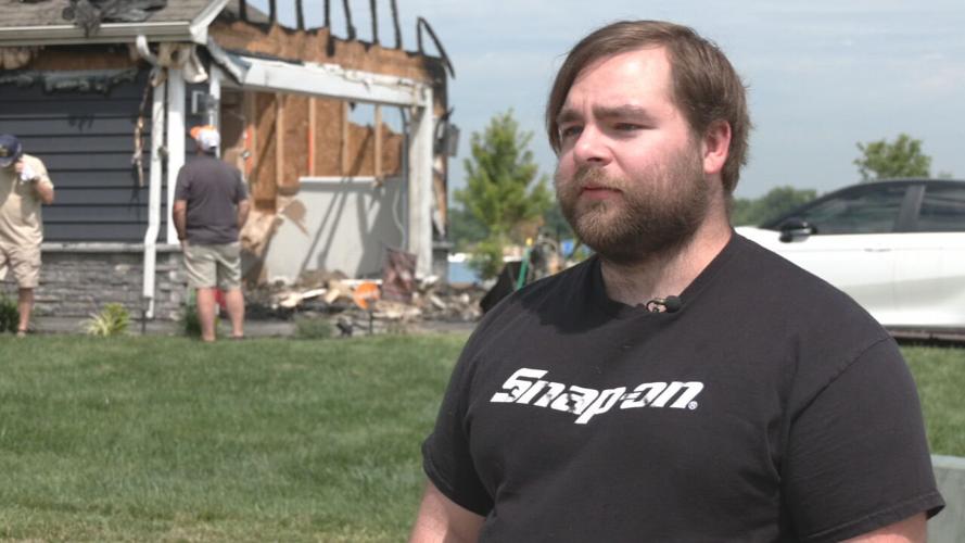 Door Dash driver Corey Yoder at scene of Jeffersonville house fire