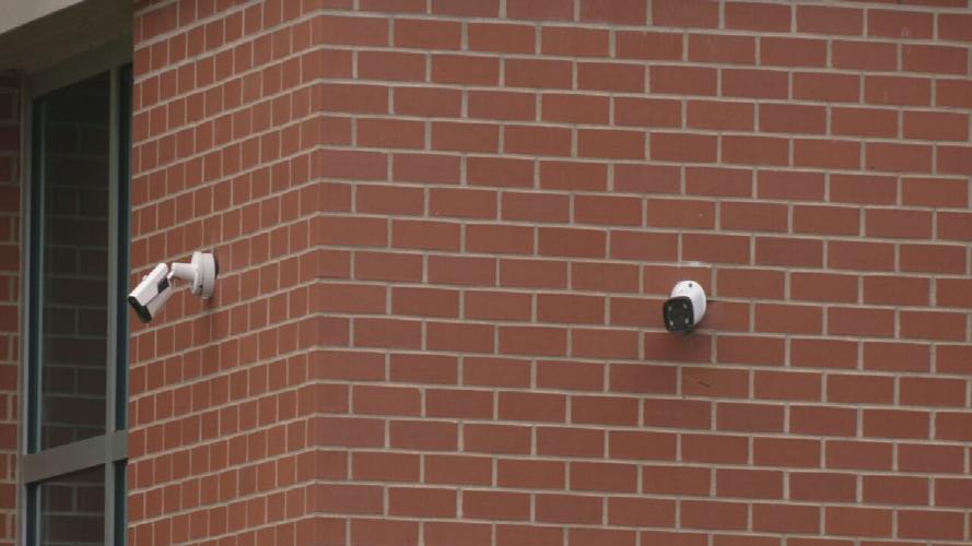 Cameras mounted to building near Harvest Homecoming shooting